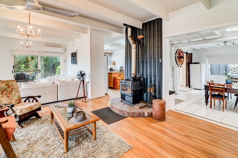 Guesthouse living room with wood-burning stove